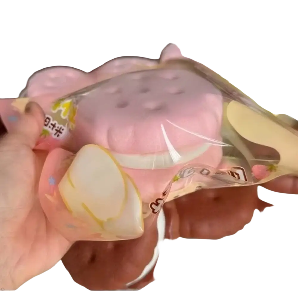 Pink and white silicone slow rising big cookie squishy toy resembling a realistic cake sandwich shape