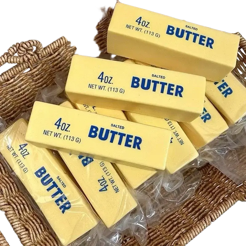 Yellow salted butter stick stress relief toys labeled 4oz made of soft material for slow rising stress relief
