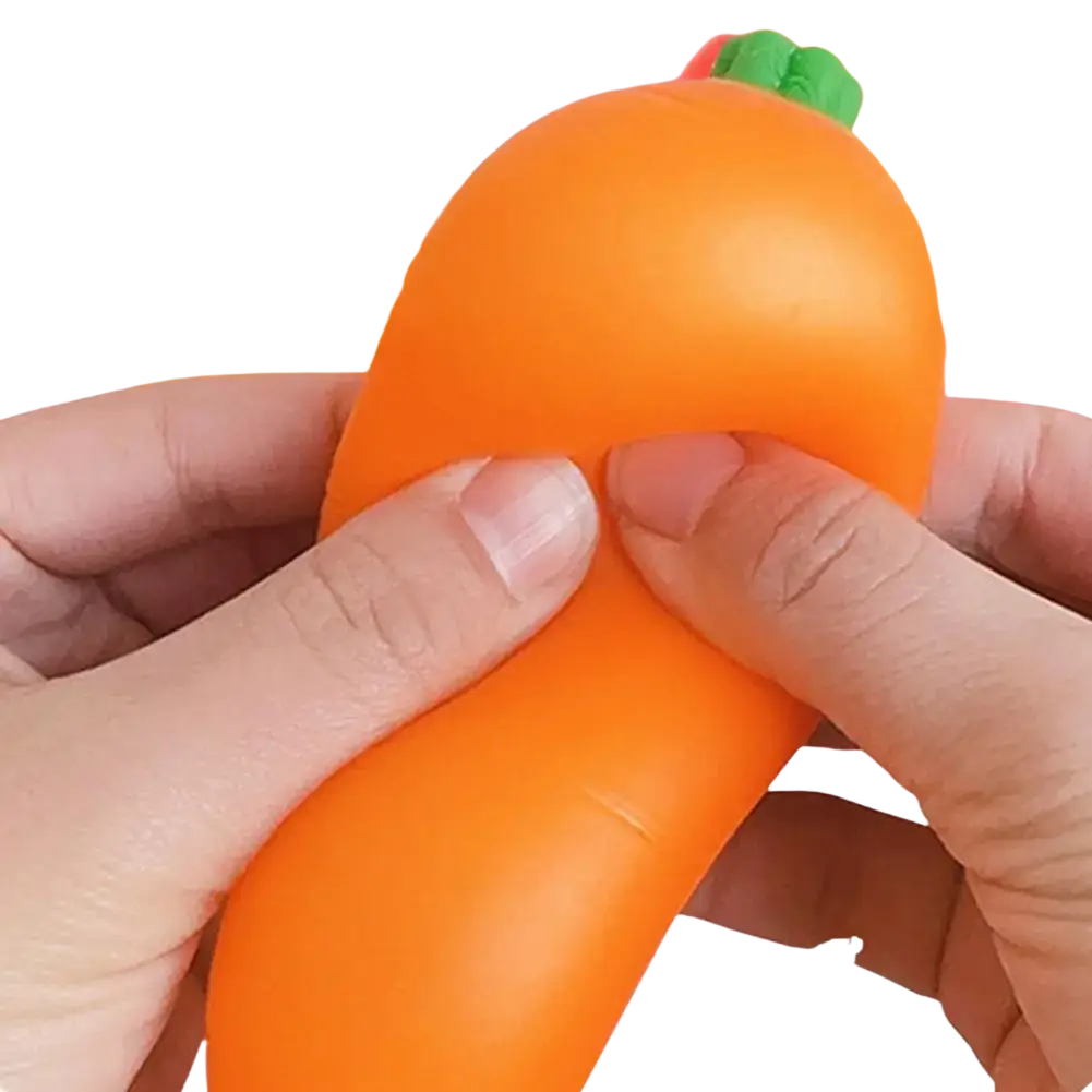Slow rising carrot squishy stress toy in orange with green leafy top made of soft silicone for stress relief