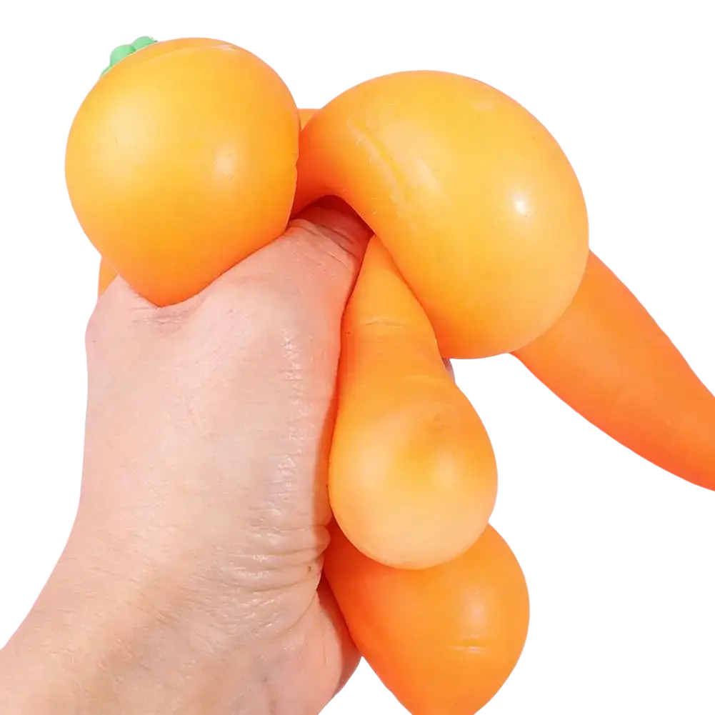 Orange carrot-shaped slow rising squishy stress toy made of soft silicone with green leafy top for stress relief
