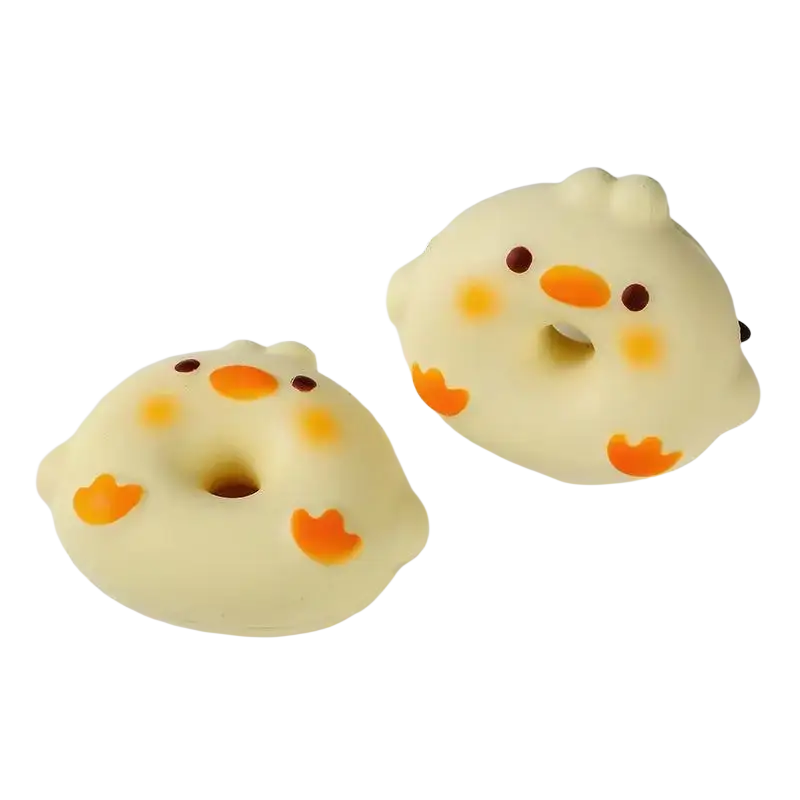 Cute yellow chick-shaped slow rising toast fidget toy with orange beak and feet for stress relief and desktop decoration
