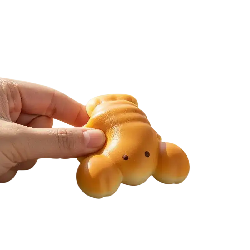 Golden-brown soft silicone slow rising toast fidget toy shaped like a bear for daily stress relief and stress relief