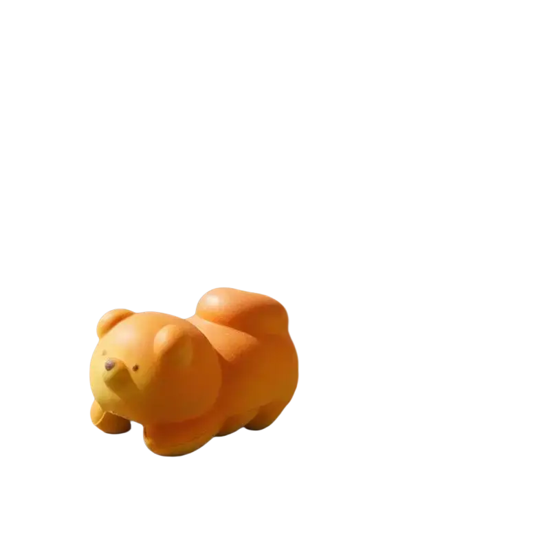 A soft orange-yellow dog-shaped slow rising fidget toy for daily stress relief and effective stress management