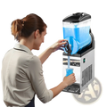 Silver and black commercial slushy machine with transparent blue liquid container for frozen drink making