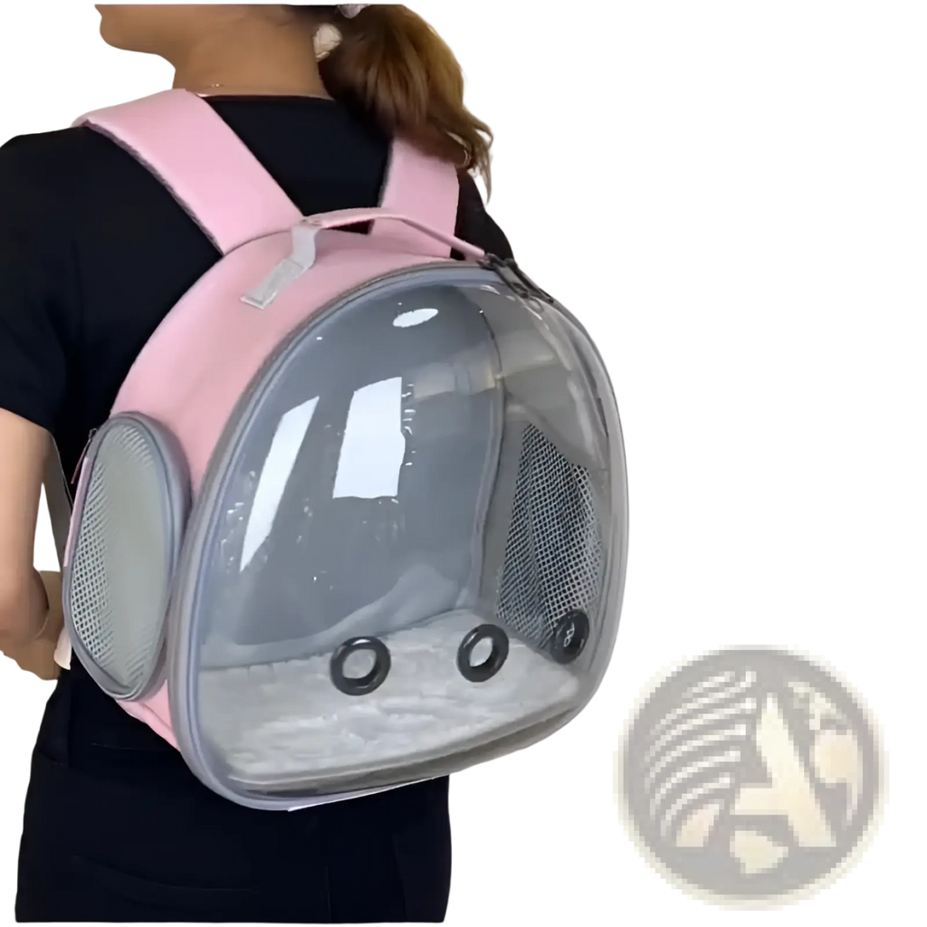 Small animal travel backpack in pink with transparent dome and mesh side panels for easy ventilation and viewing