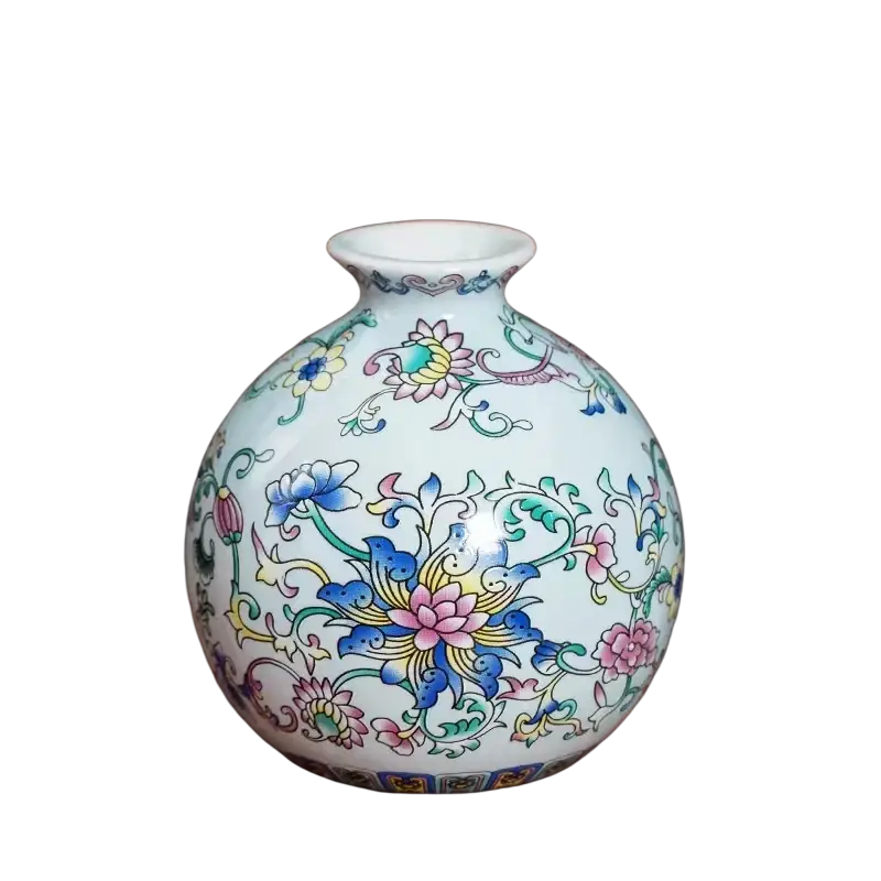 Small ceramic enamel vase made of white porcelain with vibrant blue pink and yellow vintage Chinese floral patterns