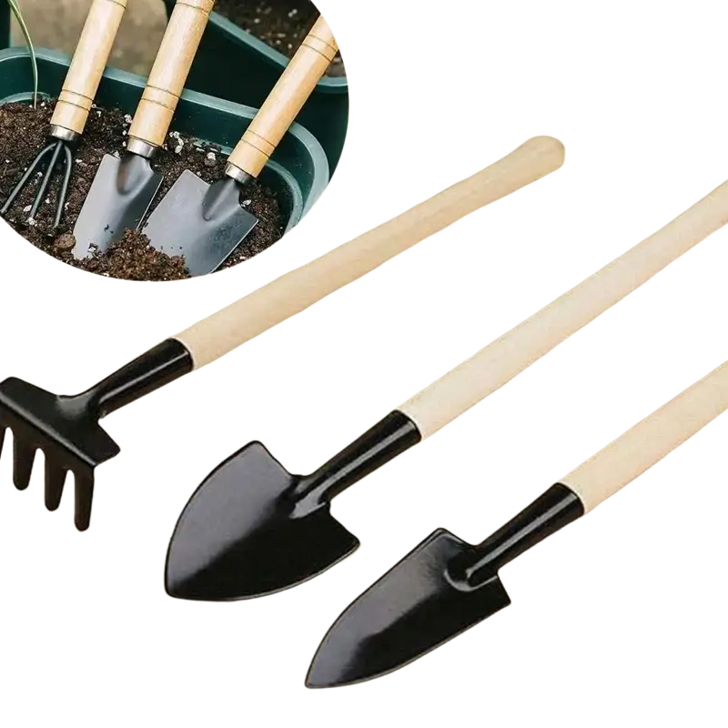 Set of three black metal small gardening tools with light wood handles including a garden shovel