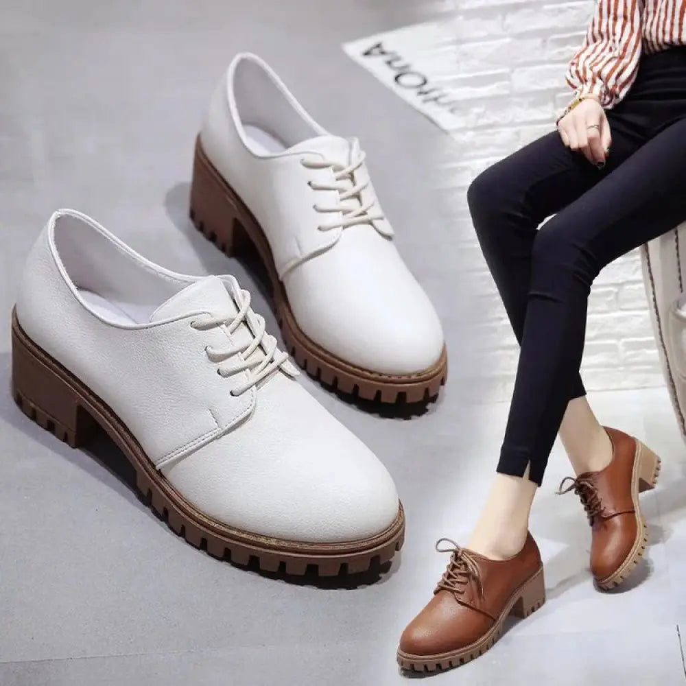 White leather lace-up women oxford shoes with brown chunky sole for stylish and durable wear