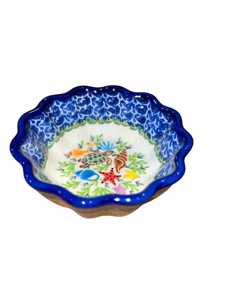 Hand-painted sealife ceramic scalloped babka bowl with blue rim and intricate lace pattern featuring colorful sea creatures