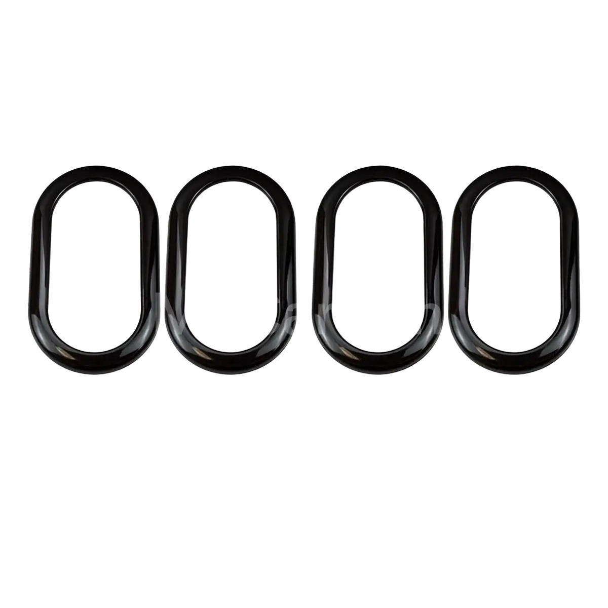 Four black oval-shaped glossy metal rings included in the smart 453 black interior exterior trim kit