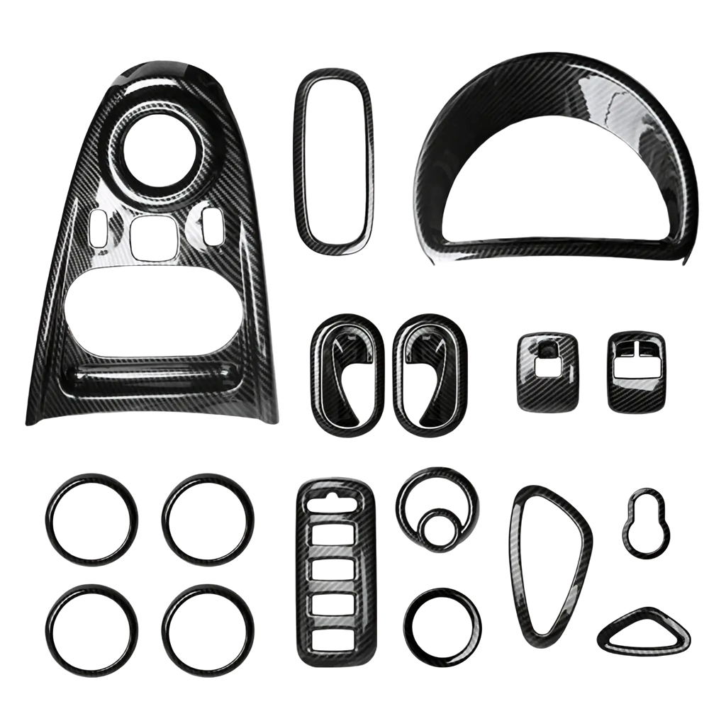 Black carbon fiber textured smart 453 air vent trim kit with glossy finish featuring various shaped interior pieces