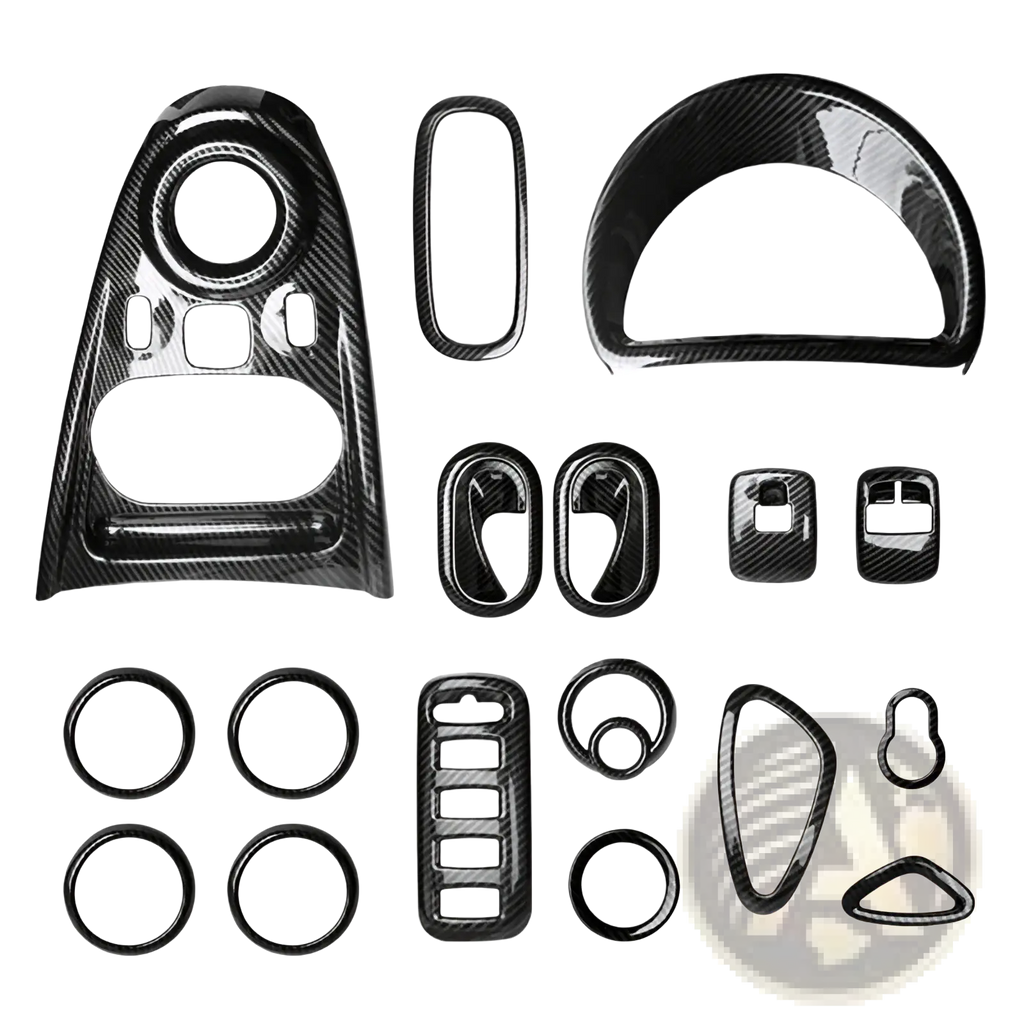 Black carbon fiber textured smart 453 air vent trim kit with glossy finish featuring various shaped interior pieces