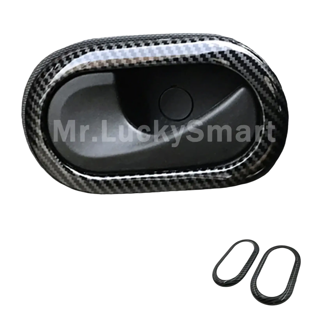 Smart 453 carbon fiber door handle trim with sleek black and gray woven pattern and glossy edges for fortwo 453