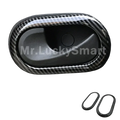 Smart 453 carbon fiber door handle trim with sleek black and gray woven pattern and glossy edges for fortwo 453