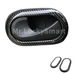 Smart 453 carbon fiber door handle trim with sleek black and gray woven pattern and glossy edges for fortwo 453
