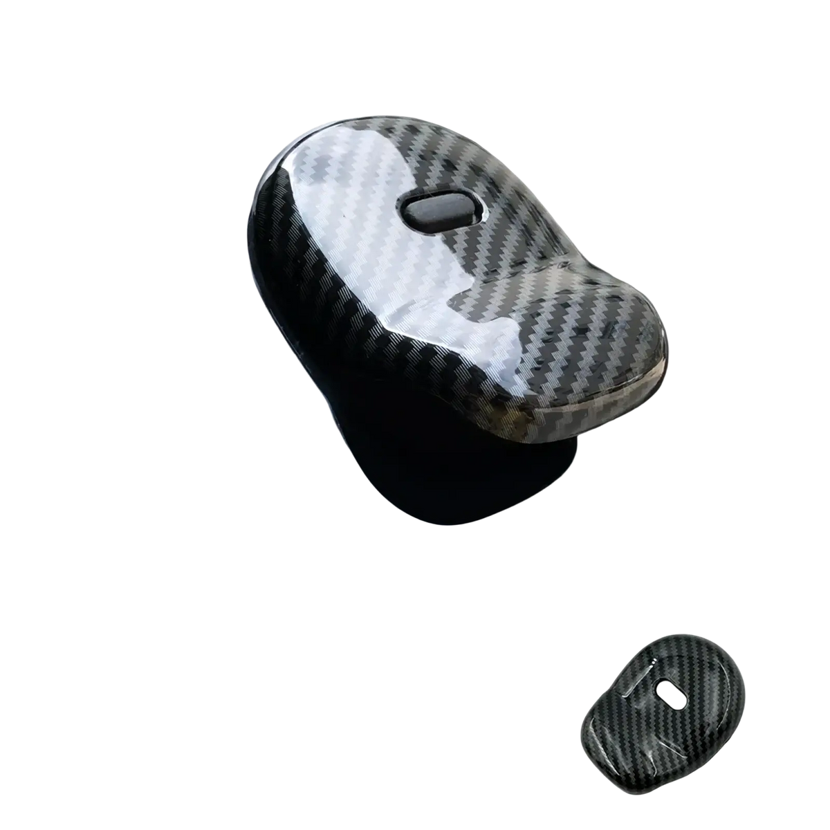 Carbon-fiber styled black key cover for smart 453 fortwo from the carbon fiber air vent trim kit shown from the back side