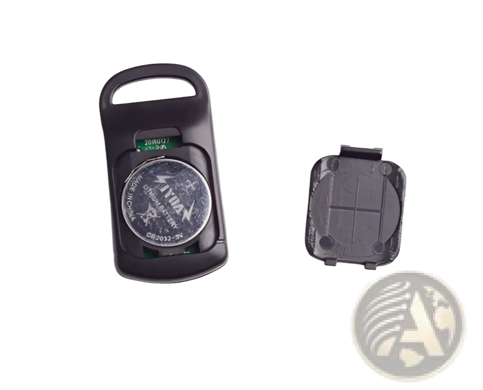 Black plastic smart bluetooth tracker tag with visible circular silver battery for keys pets and kids