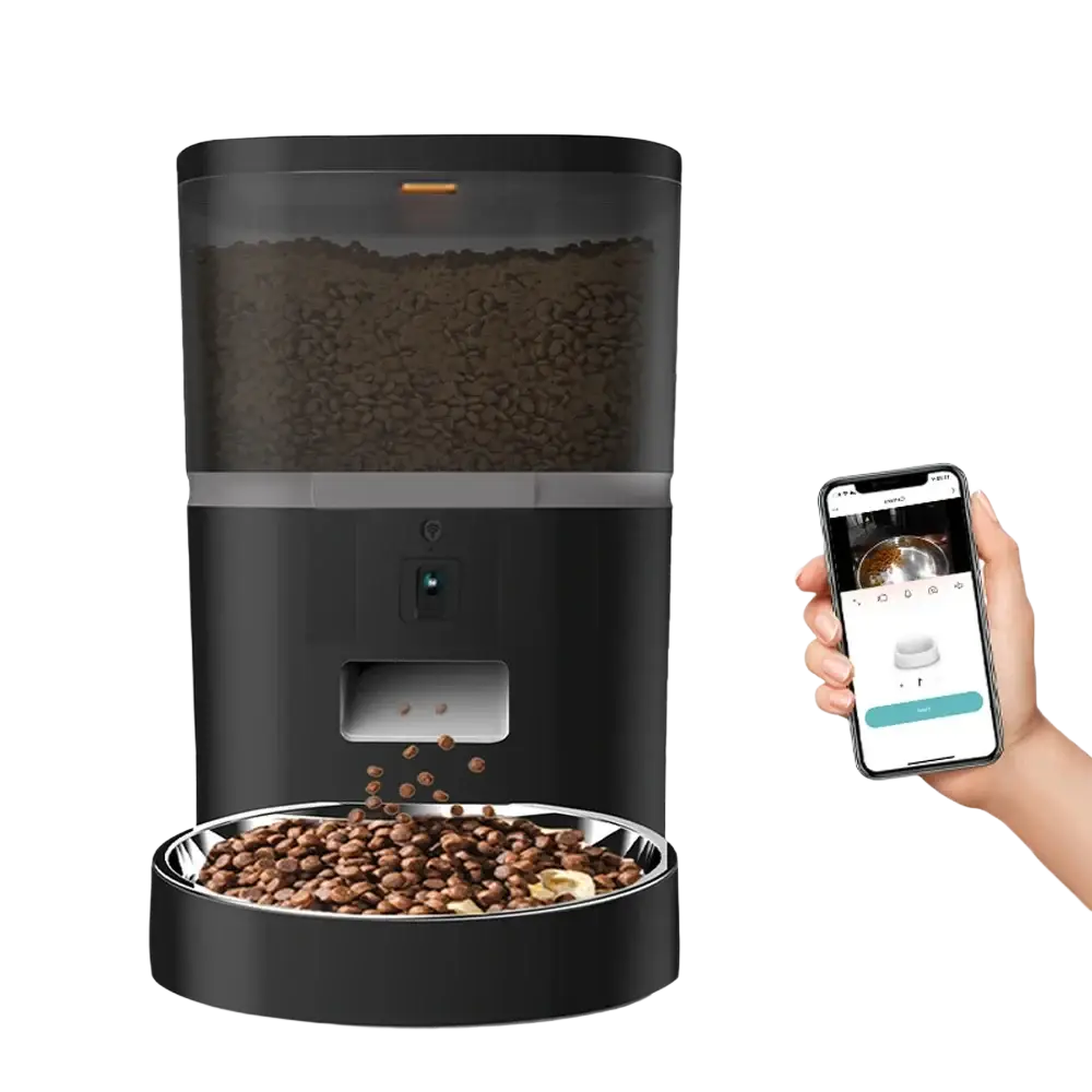 Black smart dual pet feeder with transparent kibble compartment, stainless steel bowl, and smartphone app for meal video control