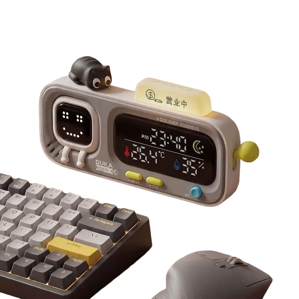 Gray duka mooda smart temperature digital clock with black cat figurine and yellow buttons displays time humidity and temperature