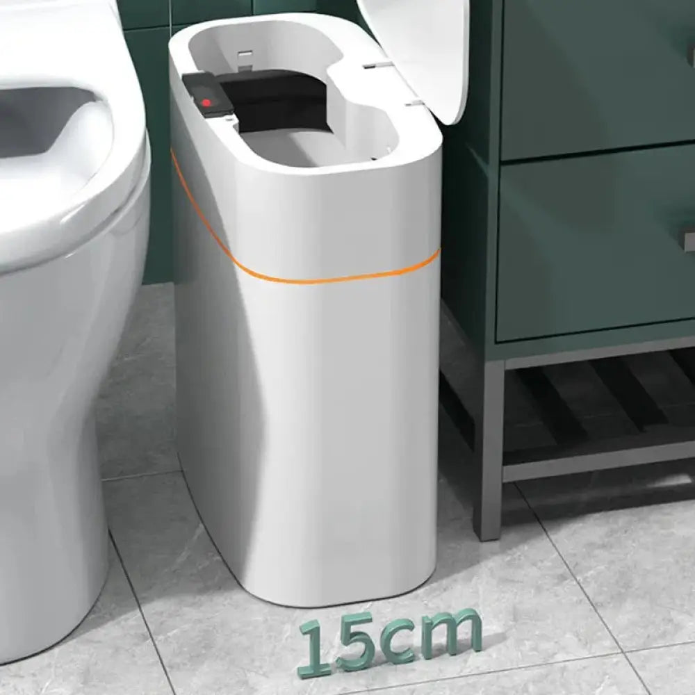 White cylindrical smart touchless motion sensor trash can with orange accent and digital display for home and car use