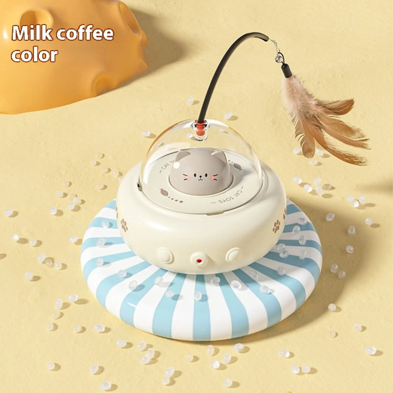 Milk coffee colored cat-shaped electric pet toy with clear dome and feather wand for cat training and play
