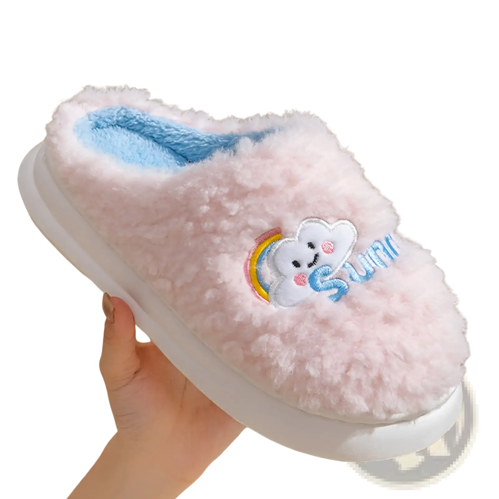 Pink fluffy slippers with embroidered smiling cloud and rainbow design featuring soft plush material and light blue lining