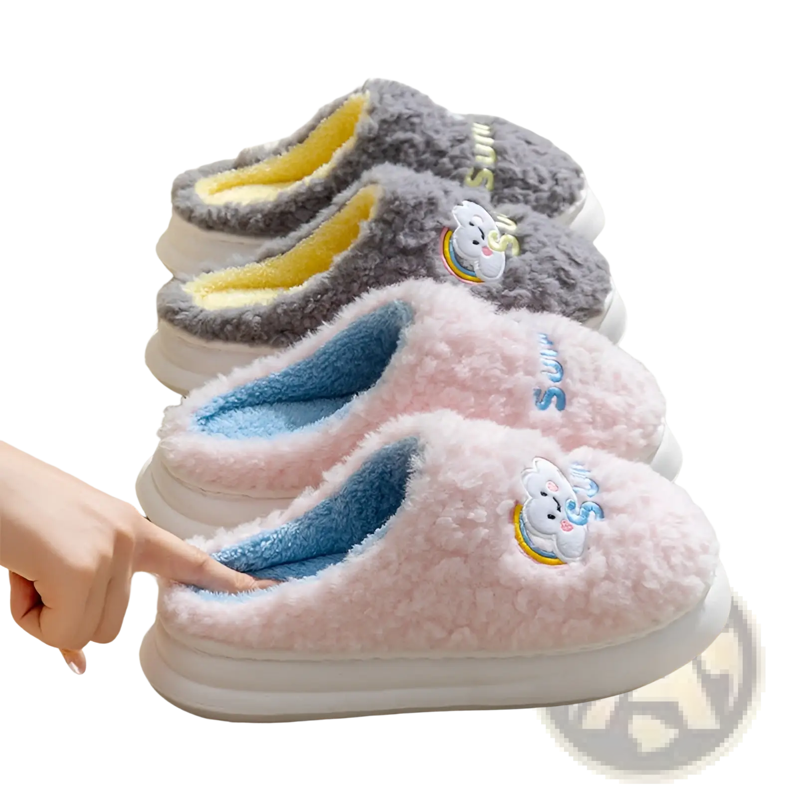 Pink and gray plush cotton slip-on slippers with embroidered smiling cloud and rainbow designs on the side