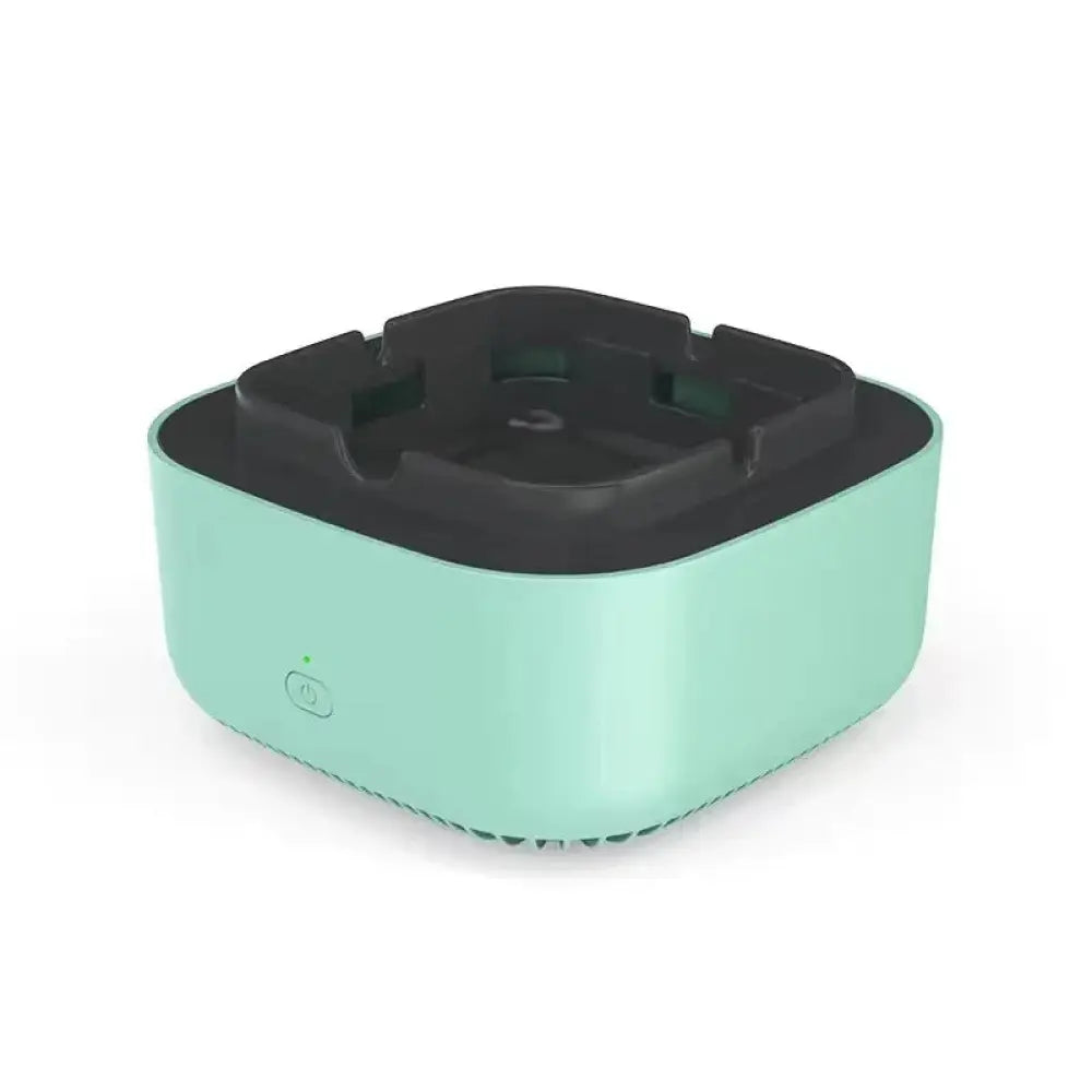 Anion smart smoke purifying portable ashtray in mint green with rectangular shape black plastic top and ventilation slits