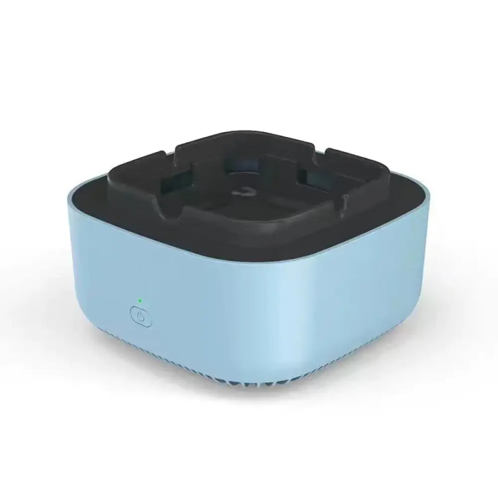 Anion smart smoke purifying portable ashtray with light blue rectangular body and black molded top with four slots