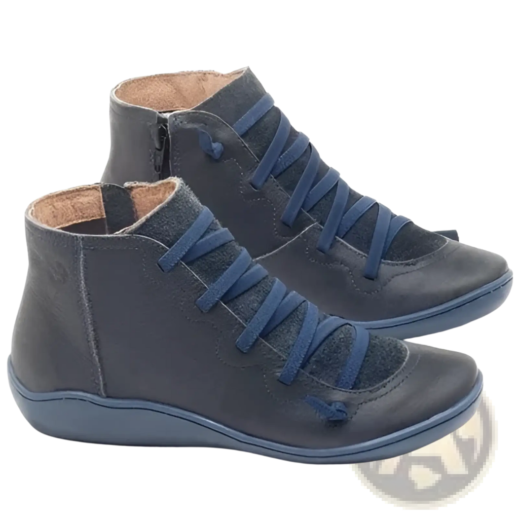 Dark blue suede and leather high-top wedge ankle boots for women with matching laces and snake print details
