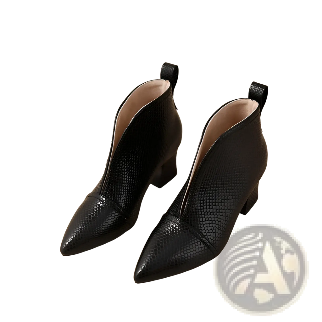 Black snakeskin ankle boots with v cut pointed toe and low block heel in a sleek elegant design