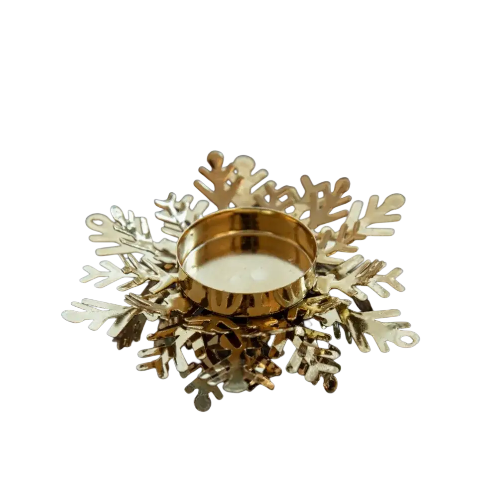 Golden iron snowflake candle holder with intricate cut-out design and metallic finish for elegant table decoration