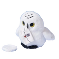 White plush snowy owl toy with yellow eyes black beak and embroidered letter wearing a scarf