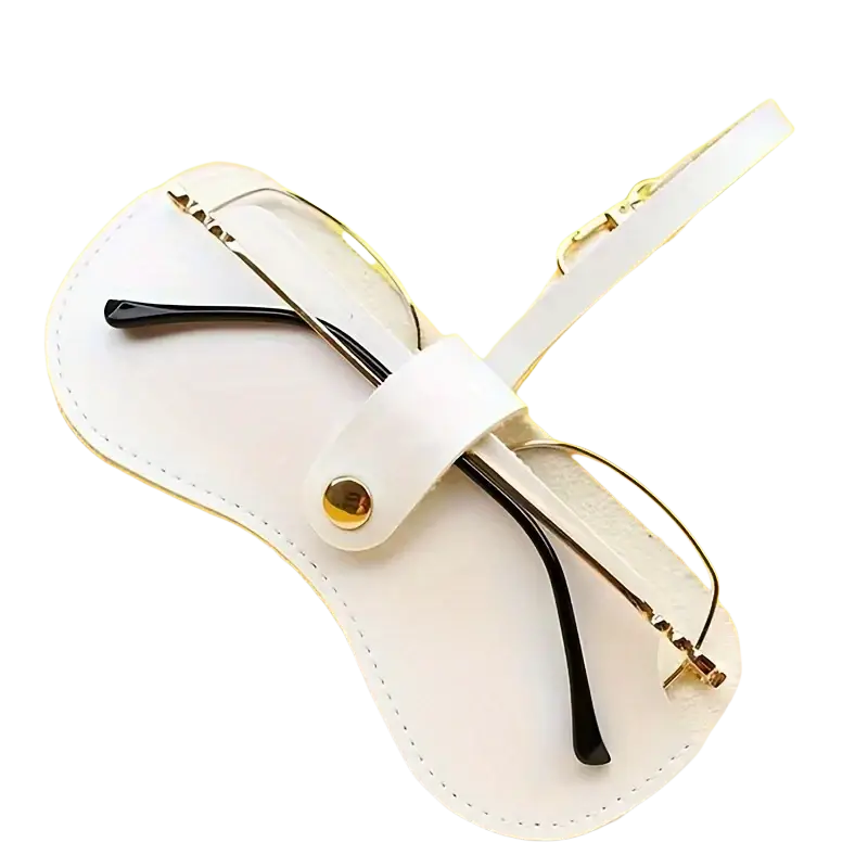 Soft leather eyeglass case in white with gold-tone hardware holding black-framed glasses for eyewear accessories
