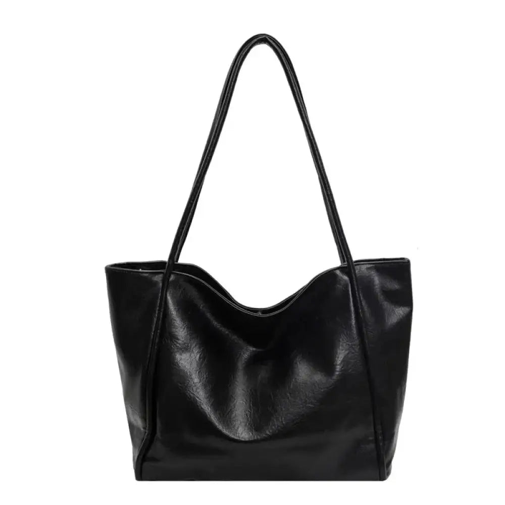 Black large faux leather minimalist commuter tote bag with long handles for daily use