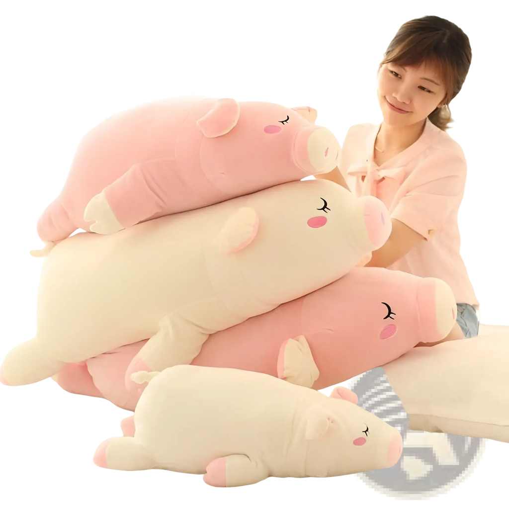 Soft pig plush toy pillow in pink and cream with closed eyes rosy cheeks and soft fabric body gift doll
