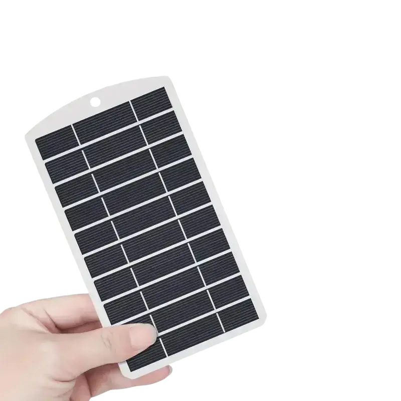 A lightweight rectangular solar panel charger with a white frame and black photovoltaic cells for portable outdoor use