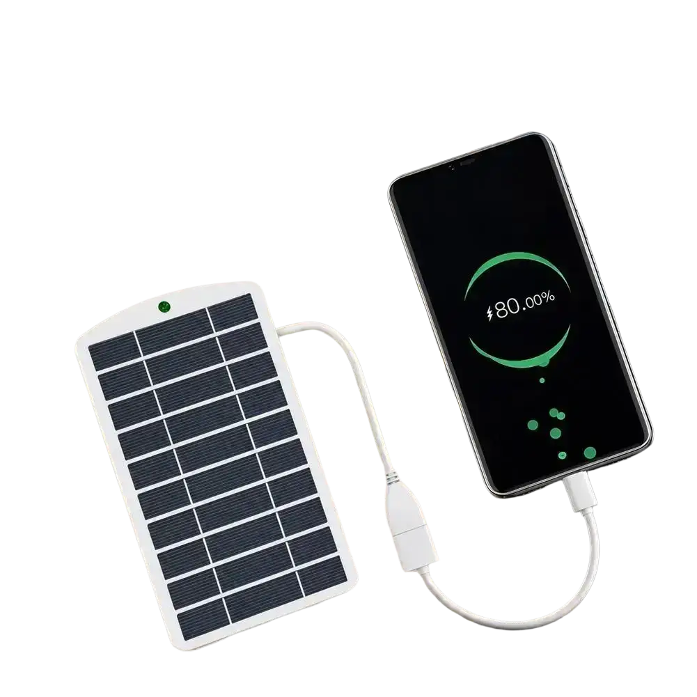White rectangular solar panel charger with black photovoltaic cells and usb cable connected to smartphone for outdoor use