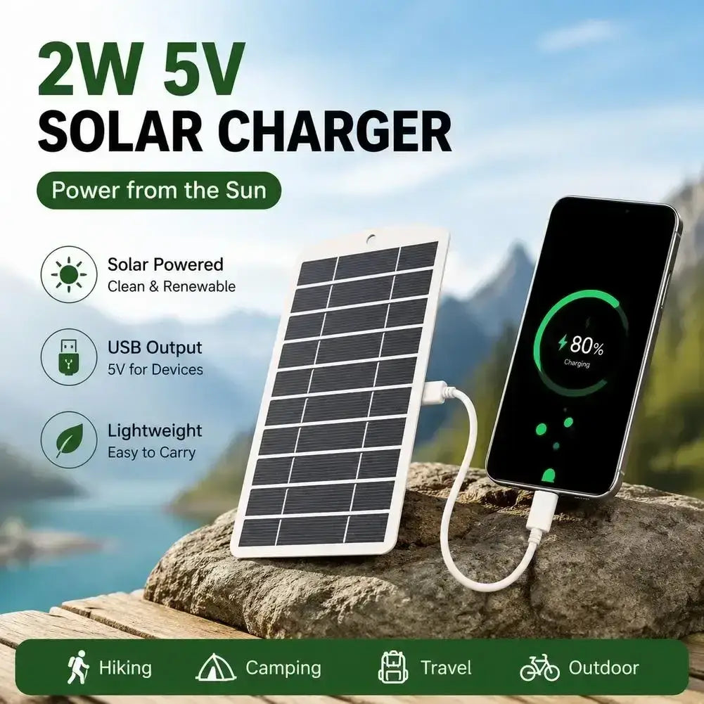 White portable 2w solar panel charger with black photovoltaic panels and usb cable connected to smartphone