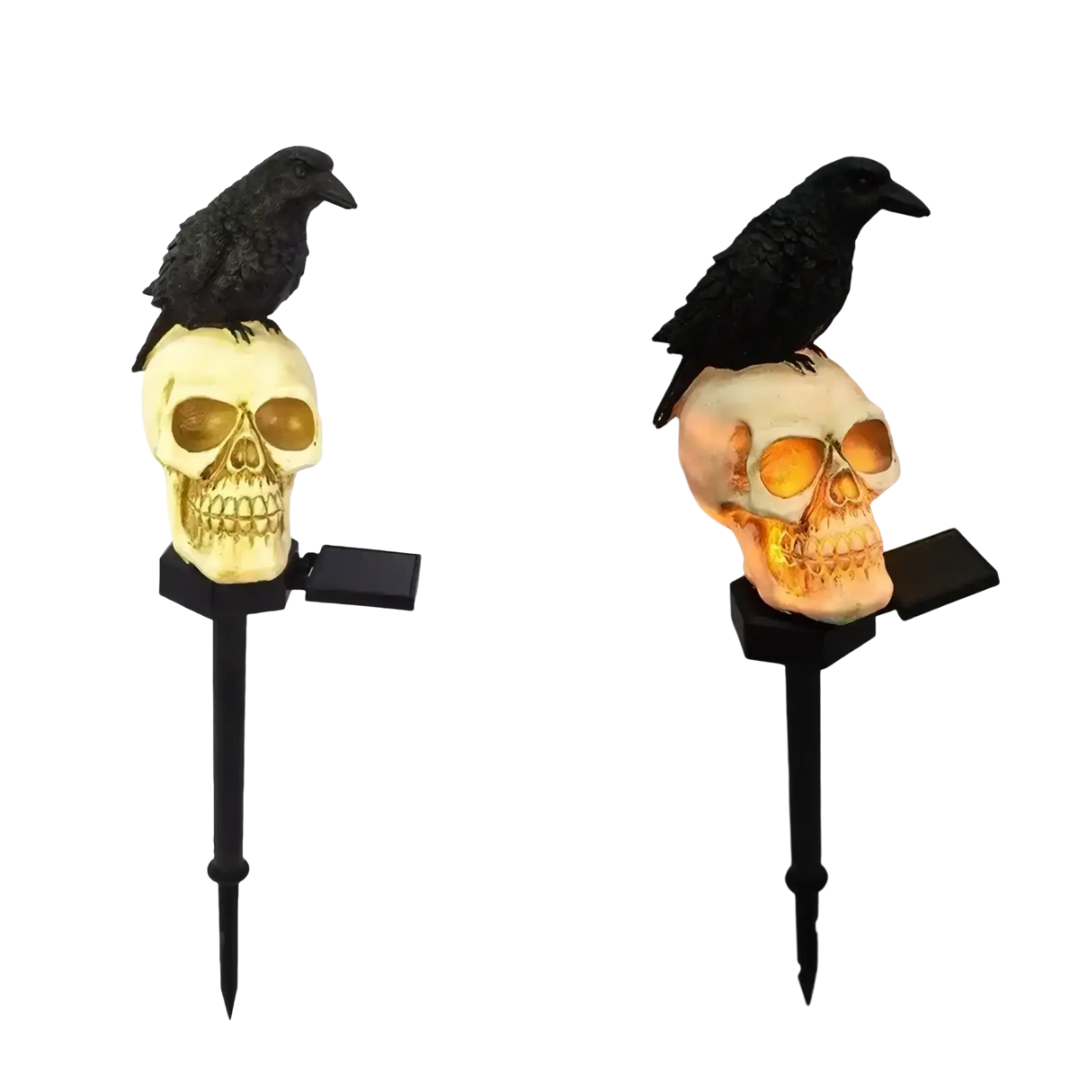 Black crow perched on a glowing orange-eyed solar skull garden light for outdoor crow garden decoration