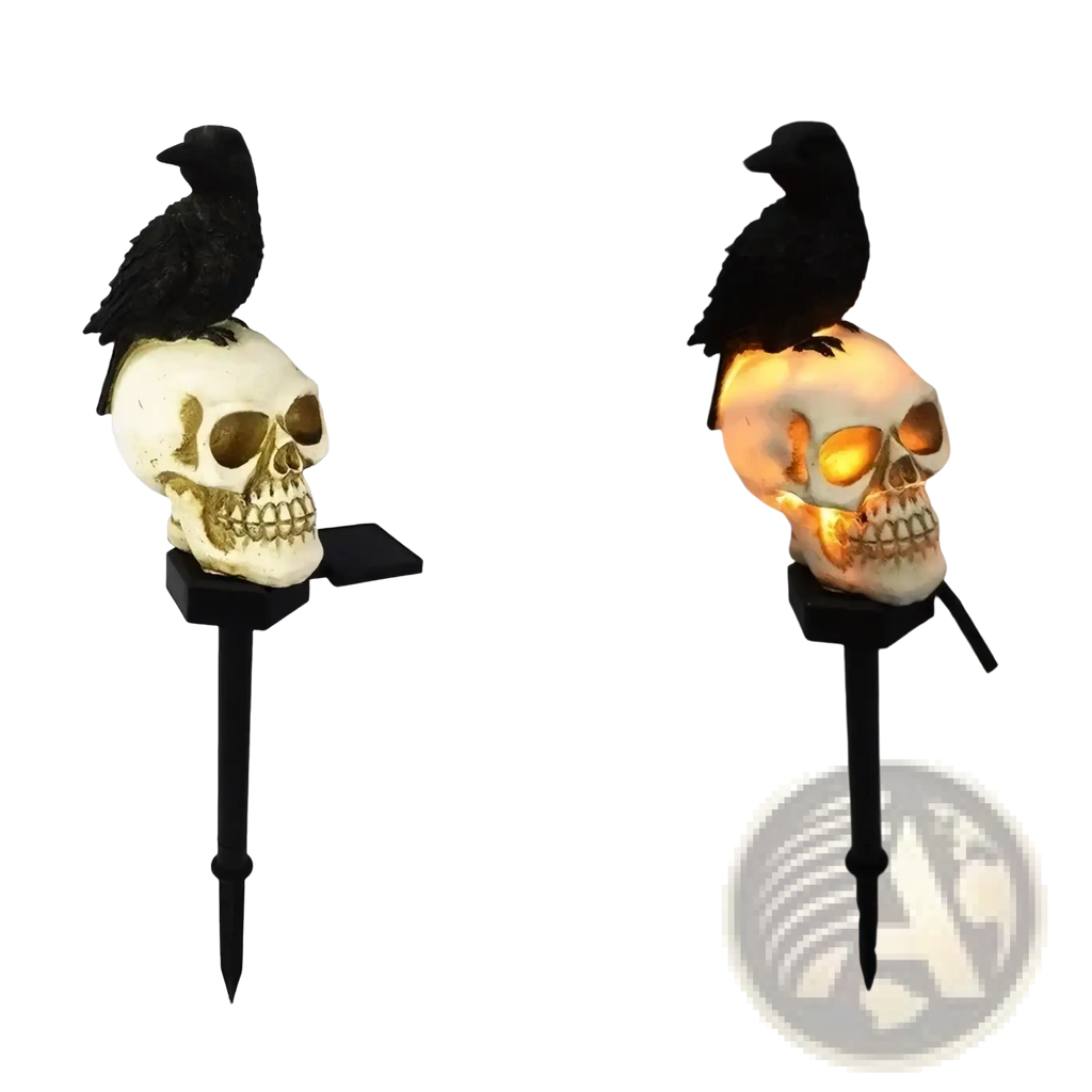Solar skull and crow garden light featuring a black crow perched on a white skull with gold accents lit from within
