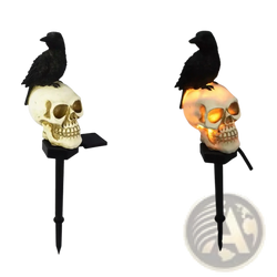 Solar skull crow garden stake halloween light features a black crow on a white skull with gold accents and orange glow