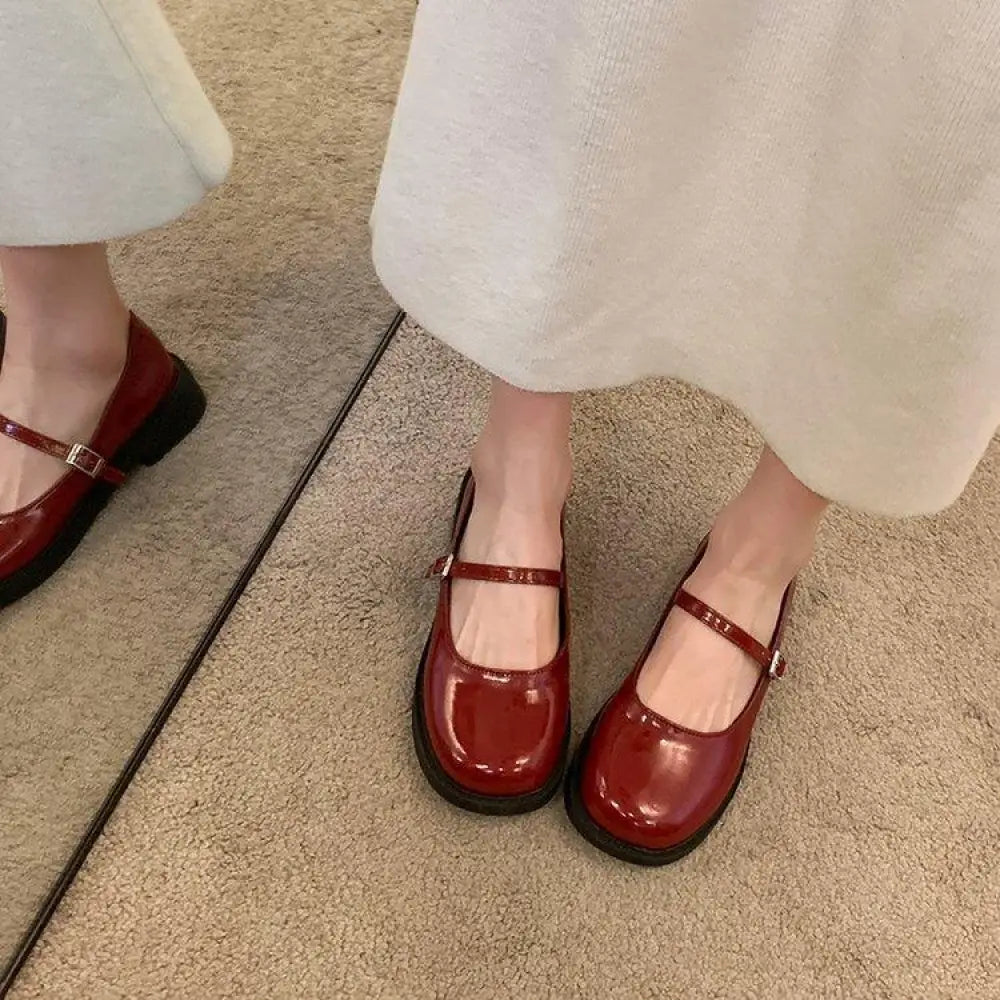 Women’s French vintage leather red patent mary jane flats with square toe and dark brown rubber sole