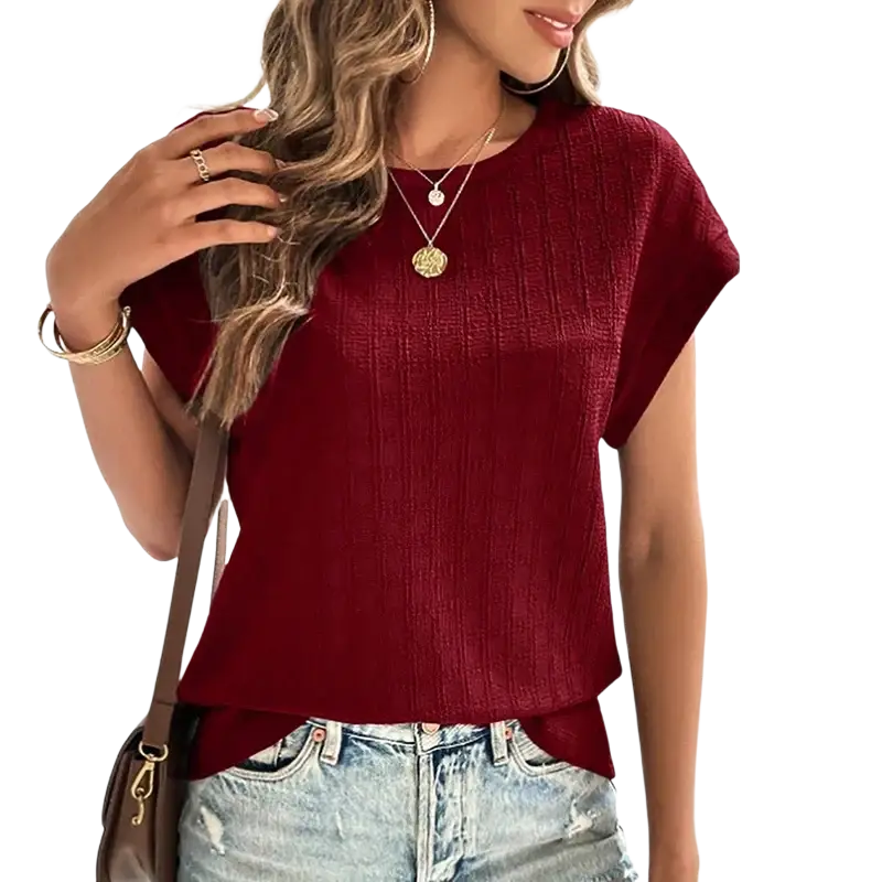 A textured maroon solid color short sleeve casual tee for women with a round neckline and comfortable fit