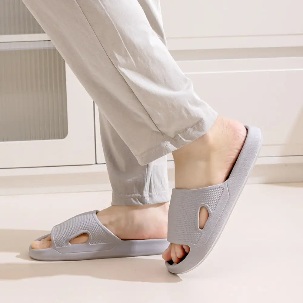 Light gray textured rubber slide sandals with cutout design thick sole non slip cushioned home slides