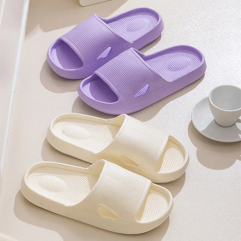 Pair of lavender and off-white mesh textured plastic thick sole non slip cushioned home slide sandals