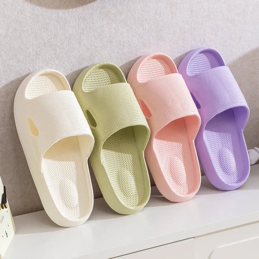 Pastel-colored thick sole non slip cushioned home slide sandals in cream mint green blush pink and lavender with mesh sole