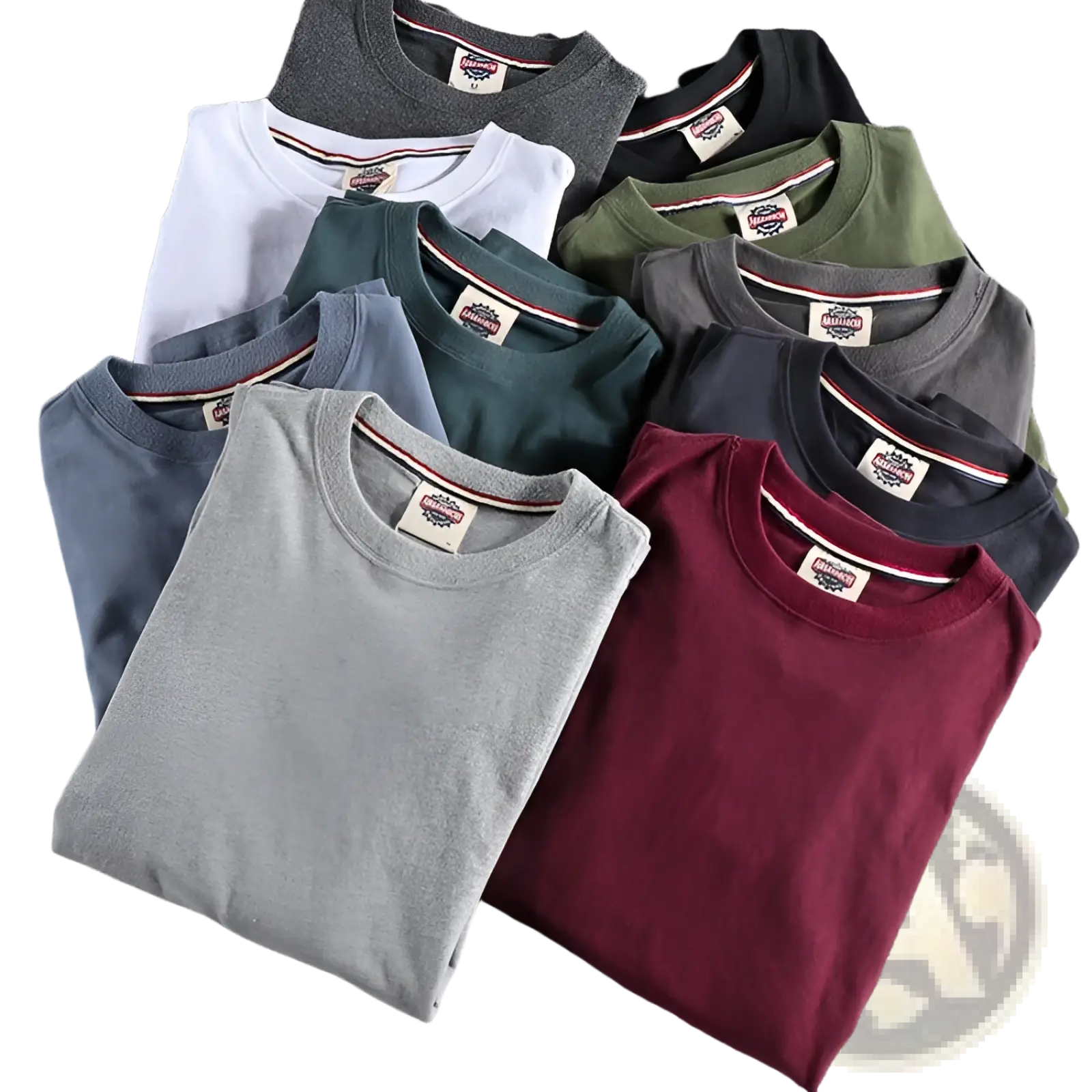 A collection of solid color washed pullover long sleeve cotton t-shirts neatly folded in white gray maroon green and navy