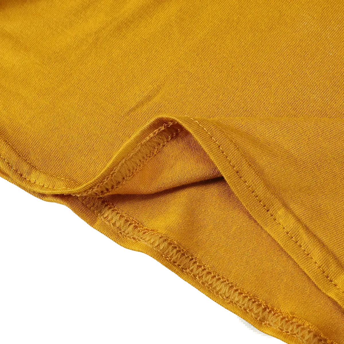 A close-up of a mustard-yellow solid underscarf hijab cap made of cotton with neatly stitched hemming