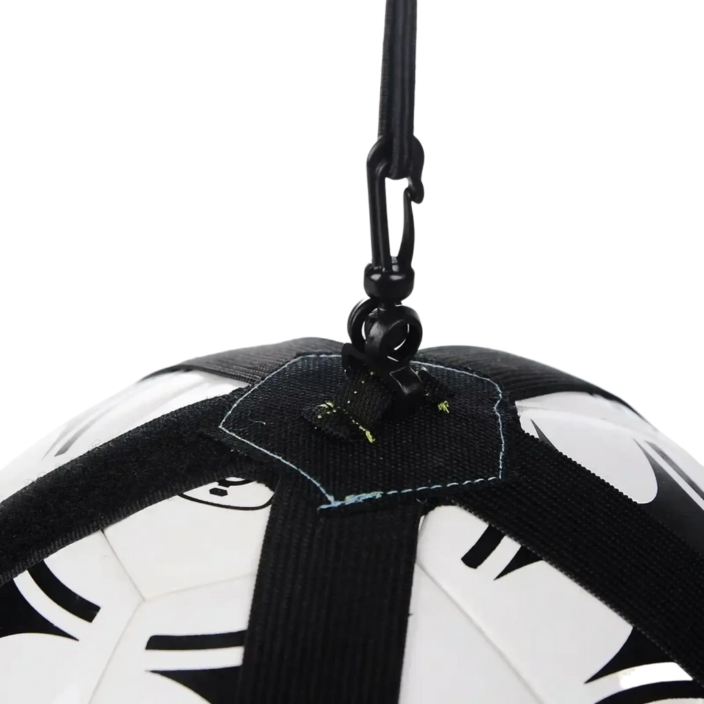 Black and white soccer ball with black strap harness and hook for hanging in solo soccer kick trainer belt